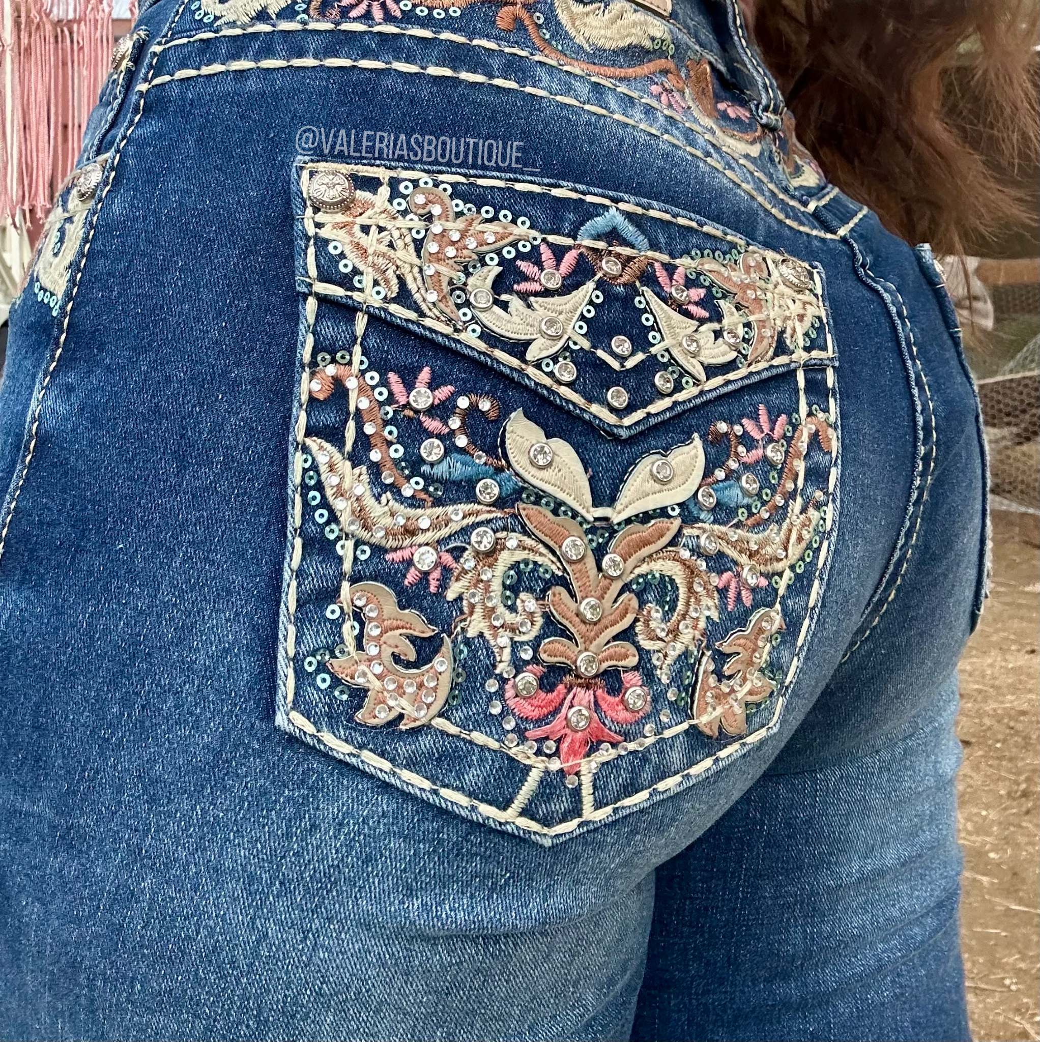 Plus size jeans with top bling on back pockets
